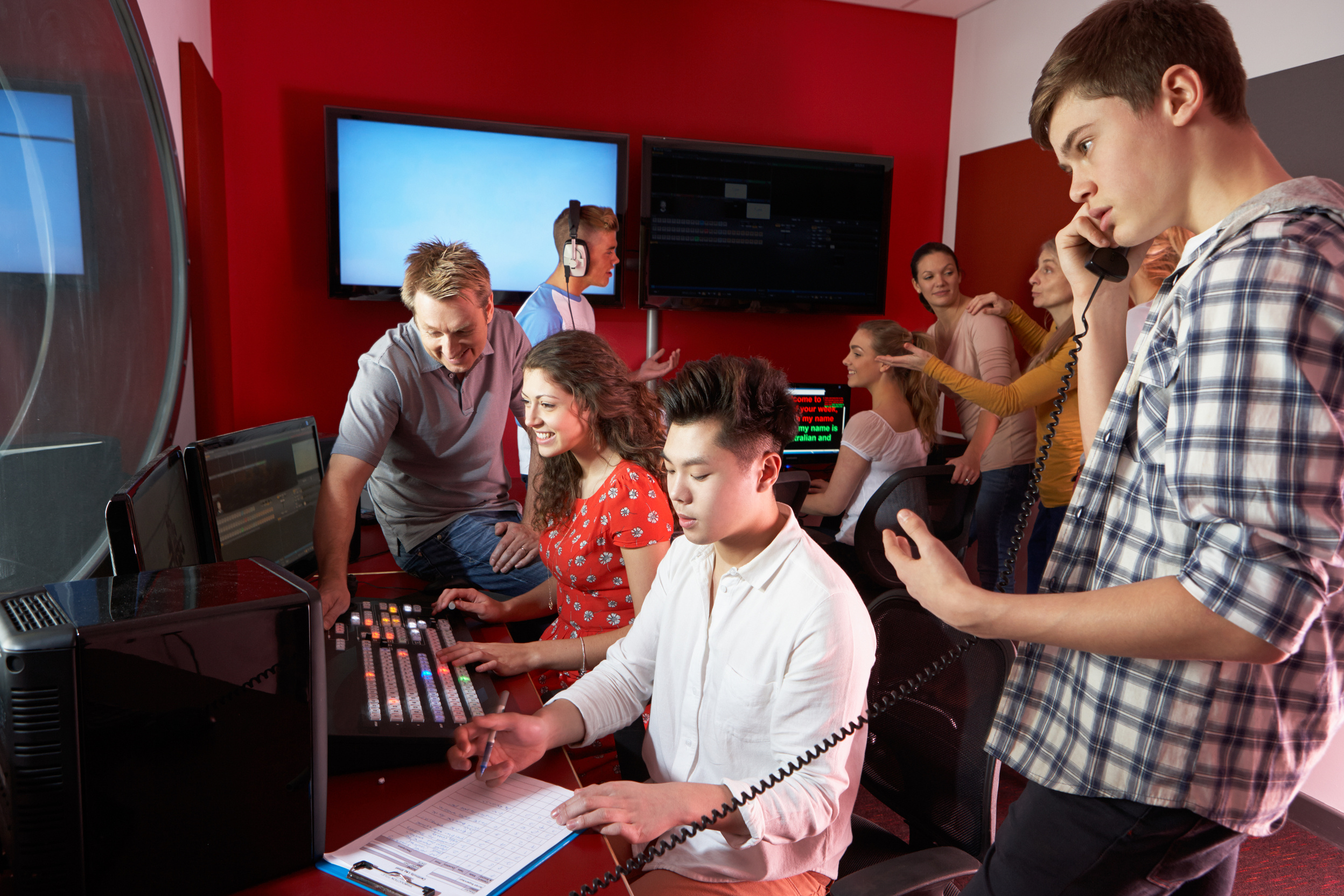 Group of Media Students Working in Film Editing Class